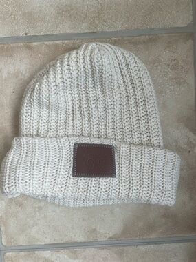 Love Your Melon Cream knit beanie brown leather logo patch; OS